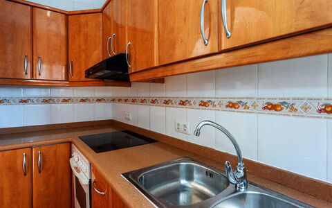 Valenciano: Brown, Kitchen Sink, Sink, Cabinetry, Countertop, Property, Photograph, Building, Tap, White