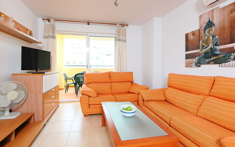 Castillo Playa: Room, Property, Furniture, Orange, Interior Design, Living Room, Building, Table, House, Yellow