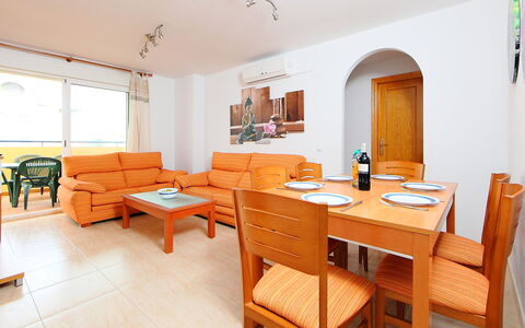 Castillo Playa: Room, Property, Furniture, Interior Design, Building, Dining Room, Table, House, Yellow, Real Estate