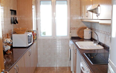 Turquesa: Countertop, Room, Property, Sink, Kitchen, Furniture, Cabinetry, Floor, Tile, Building