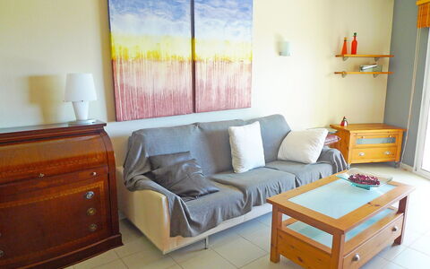 Las Dunas: Room, Furniture, Property, Bedroom, Orange, Interior Design, Floor, Yellow, Wall, Bed