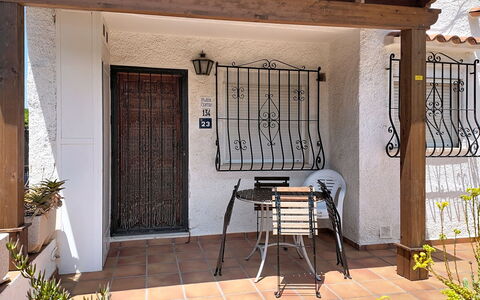 Mimosa i: Door, Iron, Wood Stain, Flowerpot, Porch, Houseplant, Home Door, Hardwood, Design, Outdoor Structure