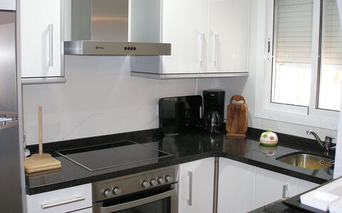 Mimosa i: Countertop, Room, Cabinetry, Kitchen, Furniture, Property, Kitchen Stove, Interior Design, Tile, Building