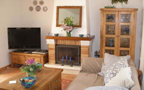 Villa Lyndy: Room, Living Room, Furniture, Property, Interior Design, House, Home, Hearth, Table, Building