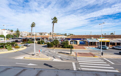 Sorolla: Residential Area, Sky, Transport, Town, Road, Urban Area, Public Space, Tree, Palm Tree, Street