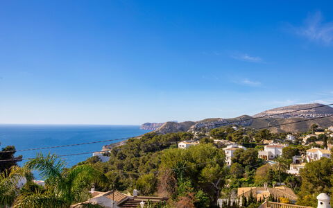 Marina: Sky, Cloud, Building, Plant, Tree, Water, Coastal And Oceanic Landforms, House, Horizon, Landscape