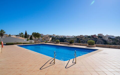 Pueblo de la Luz: Water, Sky, Swimming Pool, Azure, Building, Chair, Body Of Water, Outdoor Furniture, Tree, Shade