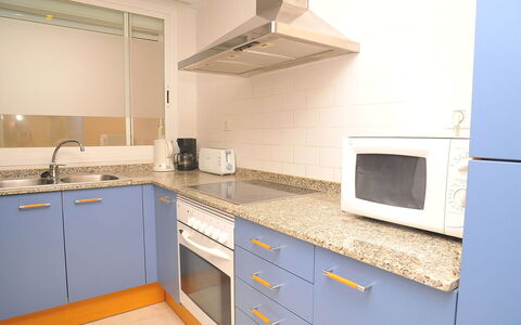 Atarazanas: Countertop, Room, Property, Kitchen, Cabinetry, Furniture, Yellow, Building, House, Kitchen Stove