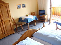 Appartementhaus mit Balkon und Gemeinschaftsgarten