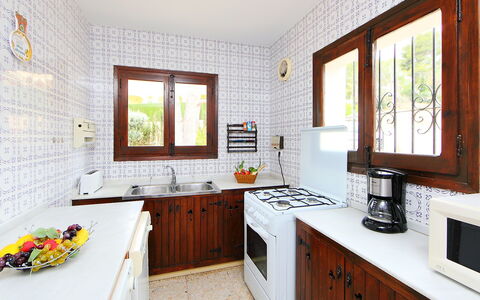 Marianne: Room, Property, Furniture, Countertop, Kitchen, Interior Design, Building, Cabinetry, Yellow, House