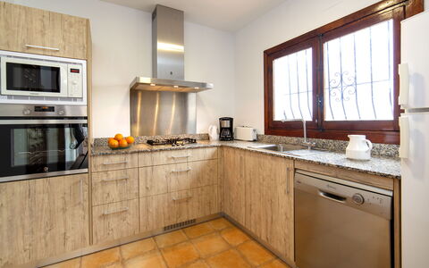 Bel: Cabinetry, Countertop, Property, Kitchen Sink, Window, Kitchen Appliance, Kitchen Stove, Sink, Kitchen, Building