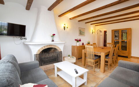Bel: Furniture, Property, Table, Couch, Comfort, Building, Wood, Lighting, Interior Design, Houseplant