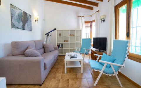 Rafol: Furniture, Property, Couch, Blue, Picture Frame, Comfort, Interior Design, Living Room, Flooring, Architecture
