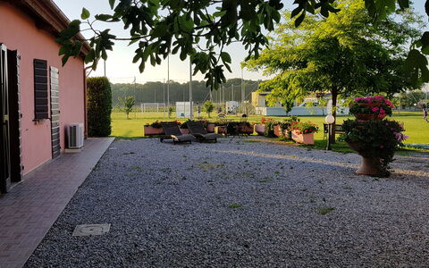 Appartamento Ibisco Seaside and Pool: Garden, Driveway, Lawn, Shade, Yard, Flagstone, Landscaping, Walkway, Cobblestone, Courtyard