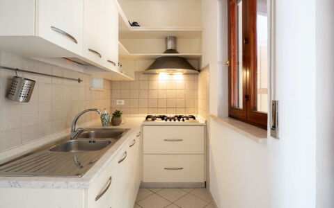 Villa Vitalis: Kitchen, Kitchen Appliance, Countertop, Major Appliance, Kitchen Sink, Interior Design, Wood, Flooring, Cabinetry, Sink