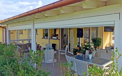 Appartamento Girasole Seaside and Pool: Ceiling, Shade, Porch, Flowerpot, Outdoor Structure, Chair, Column, Houseplant, Wood Stain, Beam