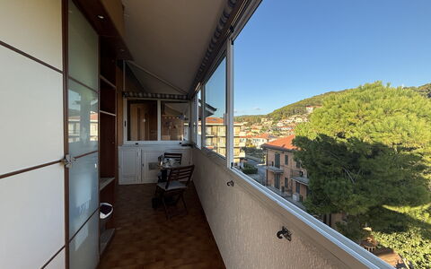La Casa di Viviana Terrace, Close to the Beach: Apartment, Balcony, Glass, Wood Stain, Hardwood, Shade, Daylighting, Deck, Aluminium, Handrail