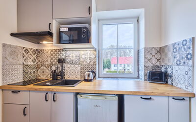 Růžová 1 101.1: Kitchen, Interior Design, Flooring, Countertop, Kitchen Appliance, Major Appliance, Plumbing Fixture, Floor, Tap, Room