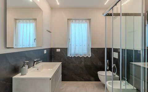 Beatrice: Flooring, Wall, Interior Design, Floor, Plumbing Fixture, Ceiling, Light Fixture, Lighting, Sink, Bathroom