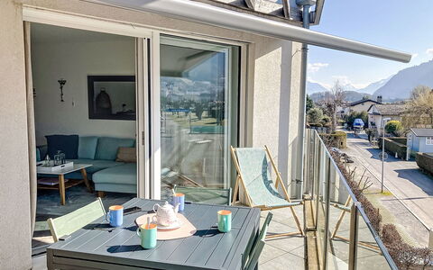 Les Perles du Lac: Furniture, Chair, Home, Outdoor Furniture, Balcony, Shade, Apartment, Outdoor Table, Kitchen & Dining Room Table, Glass