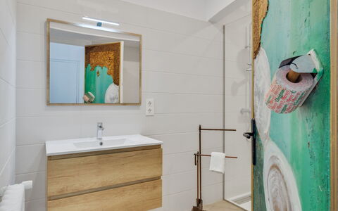Bright & Artistic: Flooring, Floor, Plumbing Fixture, Interior Design, Bathroom, Bathroom Cabinet, Toilet, Plumbing, Mirror, Tile