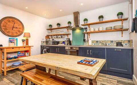 Mumbles Cottage: Flooring, Plumbing Fixture, Bathroom, Interior Design, Wood, Floor, Plumbing, Lighting, Tap, Furniture