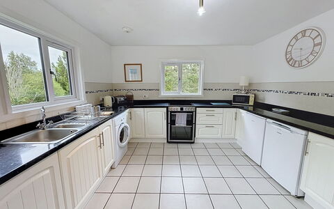 Greenaway: Kitchen, Countertop, Kitchen Appliance, Major Appliance, Flooring, Interior Design, Kitchen Stove, Cabinetry, Floor, Home Appliance