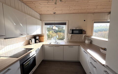 Haralde - 1.4Km from the Sea: Kitchen, Countertop, Flooring, Interior Design, Kitchen Appliance, Wood, Cabinetry, Furniture, Major Appliance, Floor