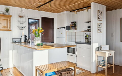 Joseph - 500M from the Sea: Kitchen, Furniture, Kitchen Appliance, Flooring, Countertop, Interior Design, Cabinetry, Wood, Floor, Wood Flooring