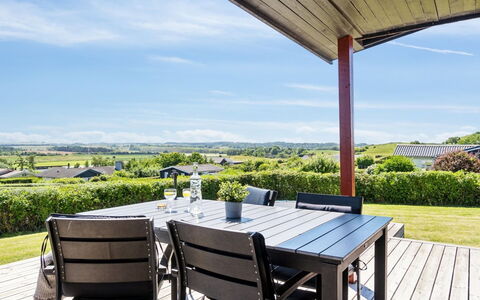 Joseph - 500M from the Sea: Sky, Furniture, Land Lot, Table, Shade, Outdoor Furniture, Groundcover, Outdoor Table, Porch, Chair
