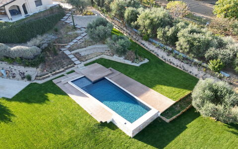 Villa Carciofa: Garden, Shrub, Swimming Pool, Landscaping, Backyard, Estate, Lawn, Yard, Villa, Courtyard