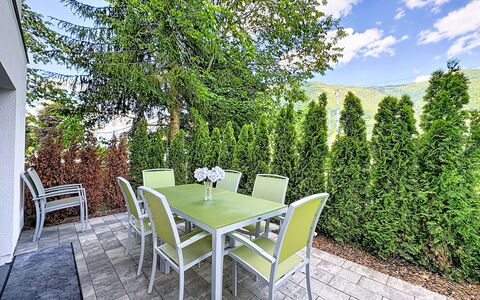 Apartment Anneliese: Shrub, Garden, Woody Plant, Shade, Landscaping, Outdoor Furniture, Yard, Chair, Outdoor Table