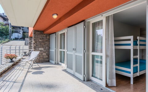 Sant'Anna: Flooring, Interior Design, Floor, Ceiling, Apartment, Wood Stain, Balcony, Daylighting, Hotel