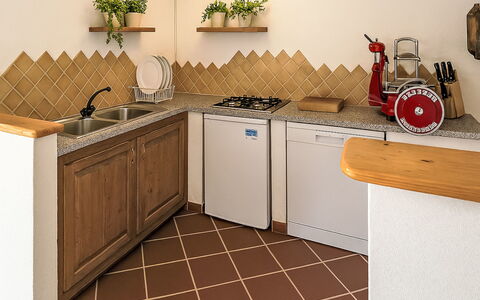 Tempio Pausania 2: Kitchen, Wood, Countertop, Kitchen Appliance, Flooring, Interior Design, Major Appliance, Floor, Furniture, Cabinetry