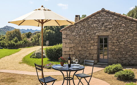 Tempio Pausania 2: Furniture, Outdoor Furniture, Outdoor Table, Table, Chair, Kitchen & Dining Room Table, Flowerpot, Umbrella, Garden, Shade