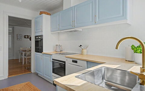 Hanni - 600M from the Sea: Kitchen, Countertop, Cabinetry, Kitchen Appliance, Interior Design, Flooring, Wood, Plumbing Fixture, Sink, Major Appliance