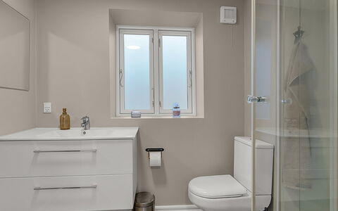 Hanni - 600M from the Sea: Bathroom, Plumbing Fixture, Flooring, Floor, Wall, Interior Design, Toilet, Bathroom Cabinet, Sink, Toilet Seat