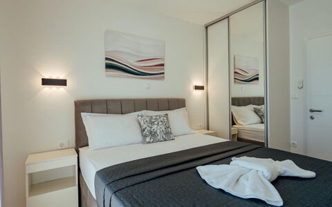 Villa Budimir: Interior Design, Furniture, Bedroom, Bed, Floor, Flooring, Room, Bedding, Pillow, Throw Pillow