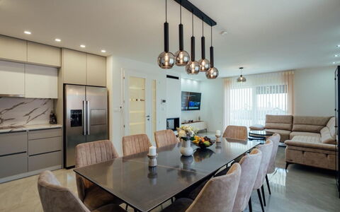 Villa Budimir: Furniture, Interior Design, Flooring, Light Fixture, Chair, Table, Wall, Dining Room, Chandelier, Kitchen & Dining Room Table