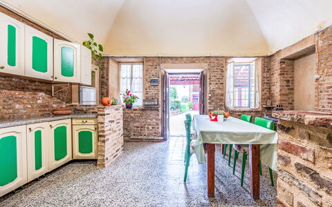 Penango 200: Chair, Brick, Houseplant, Tile, Kitchen & Dining Room Table, Countertop, Kitchen, Villa