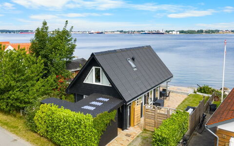 Yngvy - 10M from the Sea: House, Roof, Home, Cottage, Shrub, Groundcover, Estate, Farmhouse, Siding, Garden Buildings