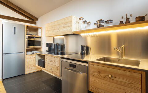 Planta Apartment: Kitchen, Countertop, Wood, Interior Design, Flooring, Furniture, Cabinetry, Kitchen Appliance, Ceiling, Home Appliance
