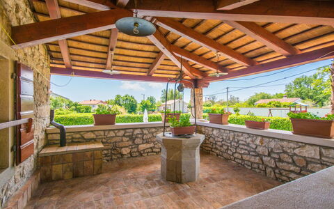 Blašković: Garden, Flowerpot, Patio, Shade, Outdoor Structure, Resort, Houseplant, Brick, Flagstone, Wood Stain