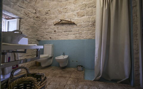 Trulli Experience, Pool, Monopoli: Wall, Plumbing Fixture, Flooring, Furniture, Floor, Interior Design, Bathroom, Bathroom Sink, Plumbing, Tap