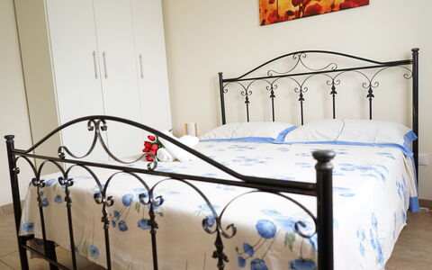 Villa Antony: Bed, Furniture, Bedroom, Bedding, Bed Sheet, Interior Design, Linens, Bed Frame, Floor, Flooring