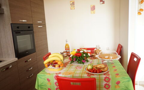 Villa Antony: Furniture, Tableware, Interior Design, Wood, Table, Room, Kitchen & Dining Room Table, Dining Room, Flooring, Fruit