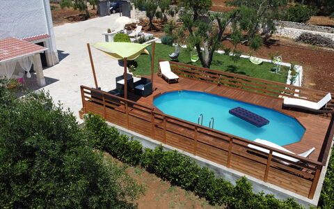 Villa Antony: Wood, Swimming Pool, Furniture, Outdoor Furniture, Deck, Resort, Wood Stain, Chair, Leisure, Shade