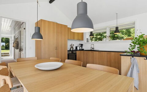 Karlotta - 500M from the Sea: Furniture, Interior Design, Flooring, Wood, Kitchen, Light Fixture, Countertop, Ceiling, Floor, Kitchen & Dining Room Table