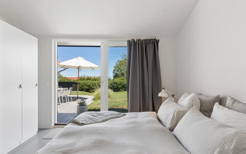 Karlotta - 500M from the Sea: Ceiling, Bedroom, Flooring, Floor, Interior Design, Home, Bed, Furniture, Linens