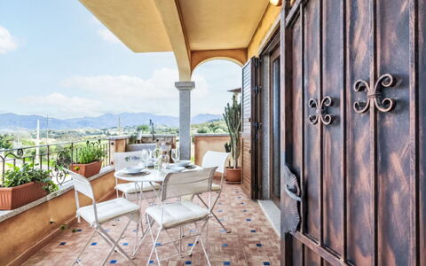 Lo Smeraldo: Furniture, Interior Design, Flooring, Floor, Chair, Ceiling, Balcony, Apartment, Kitchen & Dining Room Table, Houseplant